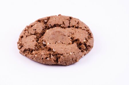 Appetizing brown cookies with cracks on a light backgroundの写真素材