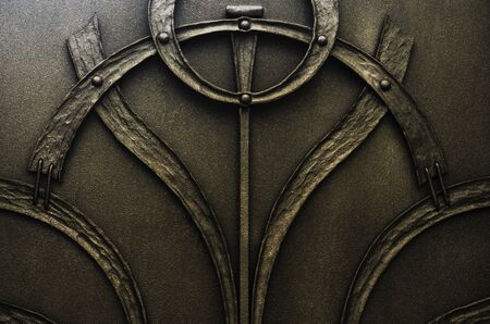 Decorative forged elements of dark metal gatesの写真素材