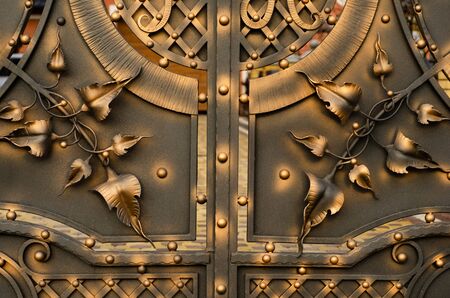 Chic forged gates with decorative elementsの写真素材