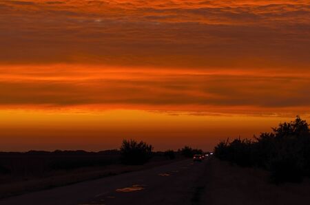 Beautiful hot sky in vibrant sunset colorsの写真素材