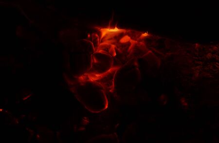 Beautiful luminous embers in a barbecue on the natureの写真素材