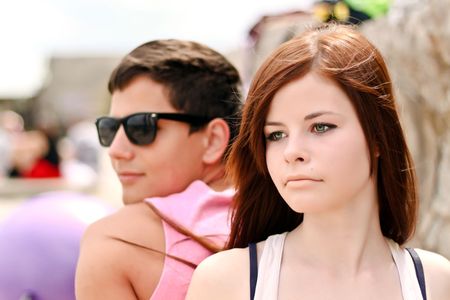 Young couple in love. Thinking about their problems.の写真素材