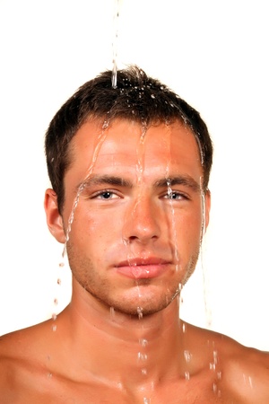 young good looking and attractive man with muscular body wetの写真素材