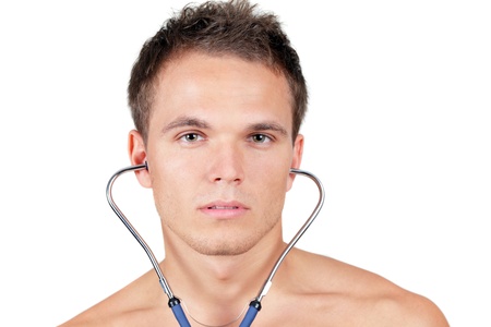 Portrait of a fit young man wuth stethoscope in his earsの写真素材
