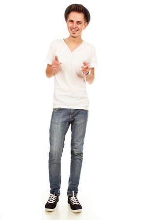 smiling young man shows on you isolated on a white backgroundの写真素材
