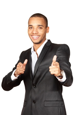Portrait of a happy African-American young businessman isolated over white backgroundの写真素材