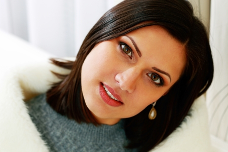 Closeup portrait of a middle-aged happy woman looking at cameraの写真素材