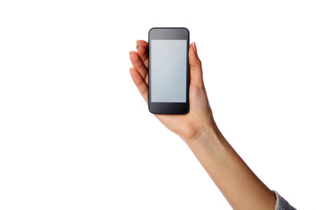 Closeup portrait of a female hand holding smartphone isolated on white backgroundの写真素材
