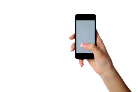 Closeup portrait of a female hand holding smartphone isolated on white backgroundの写真素材