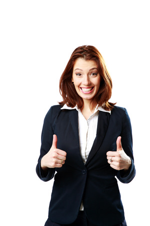 Happy businesswoman with thumbs up isolated on white backgroundの写真素材