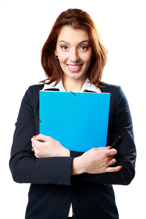 Smiling businesswoman holding notebook and pen isolated on white backgroundの写真素材