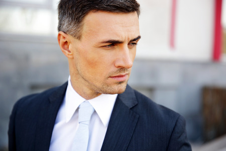 Portrait of a confident businessman looking awayの写真素材