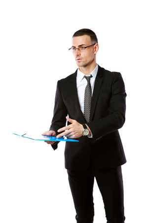 Portrait of a confident businessman with folder isolated on a white backgroundの写真素材