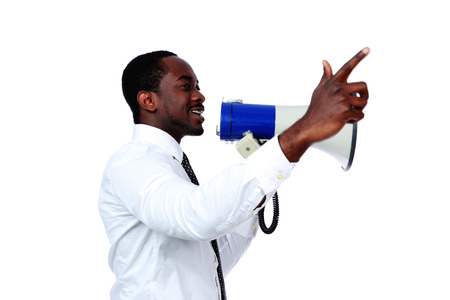 African man shouting through a megaphone isolated on a white backgroundの写真素材