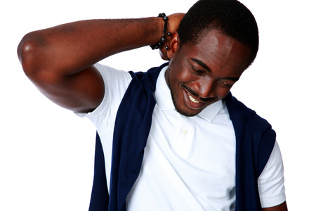 Happy thoughtful african man の写真素材
