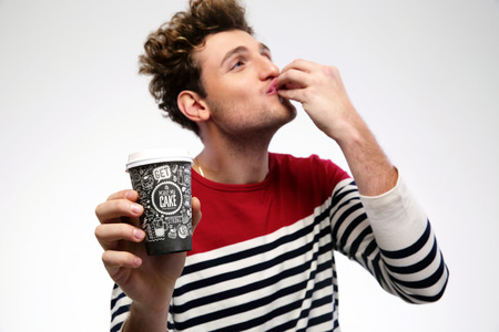 Portrait of a funny man with coffeeの写真素材