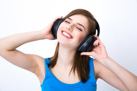 Happy woman with headphones listening music