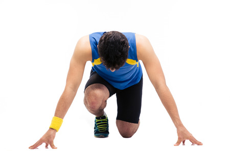 Man getting ready to run isolated on a white background