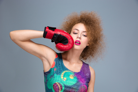 Portrait of beautiful lovely gramorous confident attractive concentrated woman in colorful top...