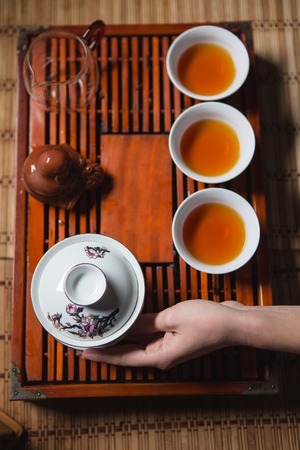 Closeup portrait of a tea ceremonyの写真素材