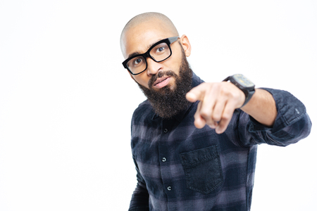 Afro american man pointing finger at camera isolated on a white backgroundの写真素材