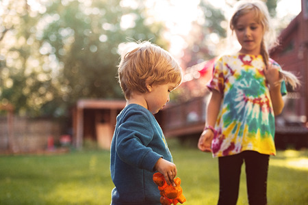 Pretty children on playground. from below imageの写真素材