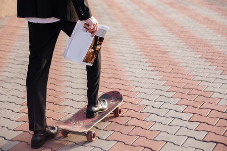 Close up man in suit on skate. cropped imageの写真素材