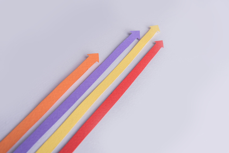 Image of business graphics arrows isolated over grey background.
