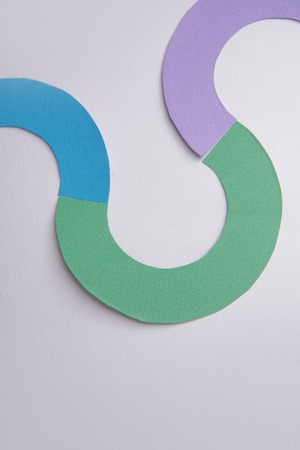 Image of business graphics diagrama isolated over grey table background.