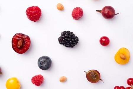 Picture of mix of berries isolated over white background table.の写真素材