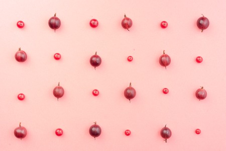Top View Image of mix of berries isolated over pink background table.の写真素材