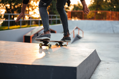 Cropped image of a skater boy practicing at the skate parkの写真素材