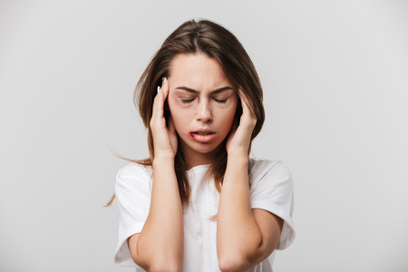 Image of a sad disabled young girl with scratches and bruises on her face.の写真素材
