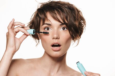 Image of a beautiful surprised shocked young pretty woman with healthy glowy skin posing isolated...