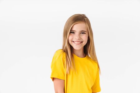 Portrait of beautiful blonde summer girl wearing casual t-shirt smiling at camera isolated over white backgroundの写真素材