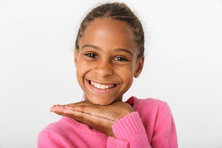 Image closeup of funny african american girl laughing and looking at camera isolated over white...