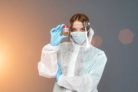 female doctor in protective suit and glovesの写真素材
