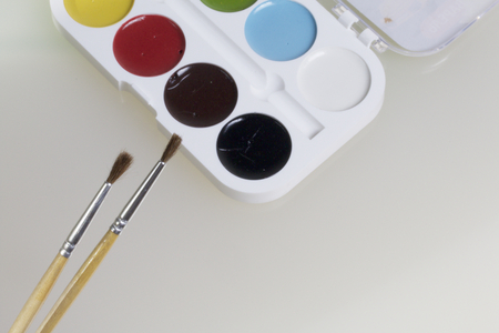 Watercolors and brushes for painting. On a white background.の写真素材