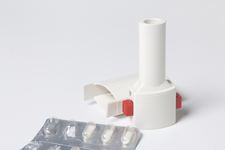 Inhaler and powder for inhalation in capsules. Prevention and treatment of bronchospasm.の写真素材