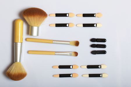 Beauty knolling. Applicator eye shadow and brush for applying makeup.の写真素材