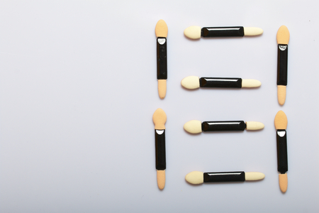 Beauty knolling. Applicator of eye shadow.
