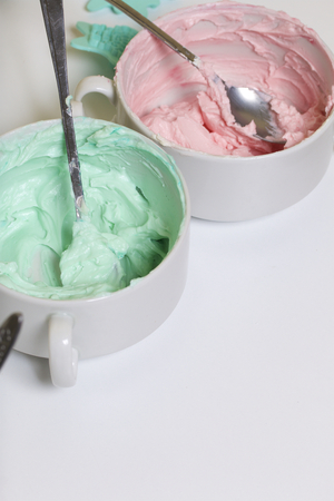 Cream of different colors for decorating waffle cake.の写真素材