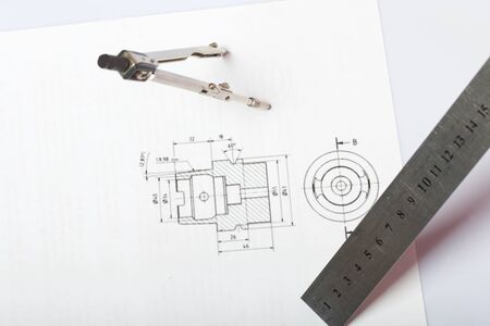 A figure drawn by a compass on white paper. Triangle, circle and compass in space.の写真素材