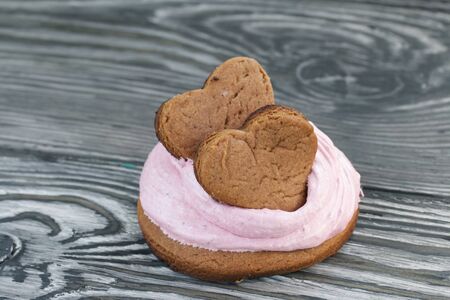Marshmallows sandwiches made from chocolate dough and blueberry marshmallows. Decorated with cookies...