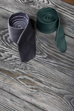 Two men's ties in different colors and sizes. For father and son. Love and Togetherness Objects.の写真素材