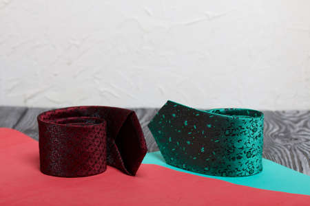 Two men's ties in different colors and sizes. For father and son. Love and Togetherness Objects. On...