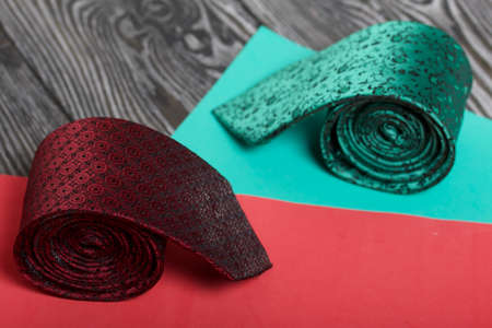 Two men's ties in different colors and sizes. For father and son. Love and Togetherness Objects. On...