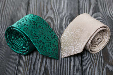 Two men's ties in different colors and sizes. For father and son. Love and Togetherness Objects. On...