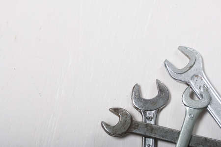 Spanners of different sizes on a light background.
