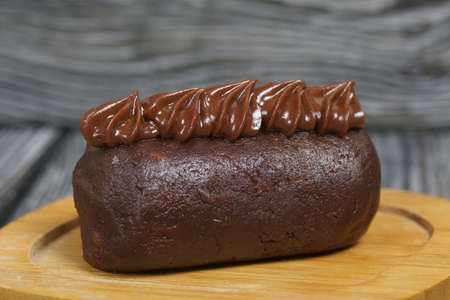 Potato cake. Decorated with chocolate cream.の写真素材